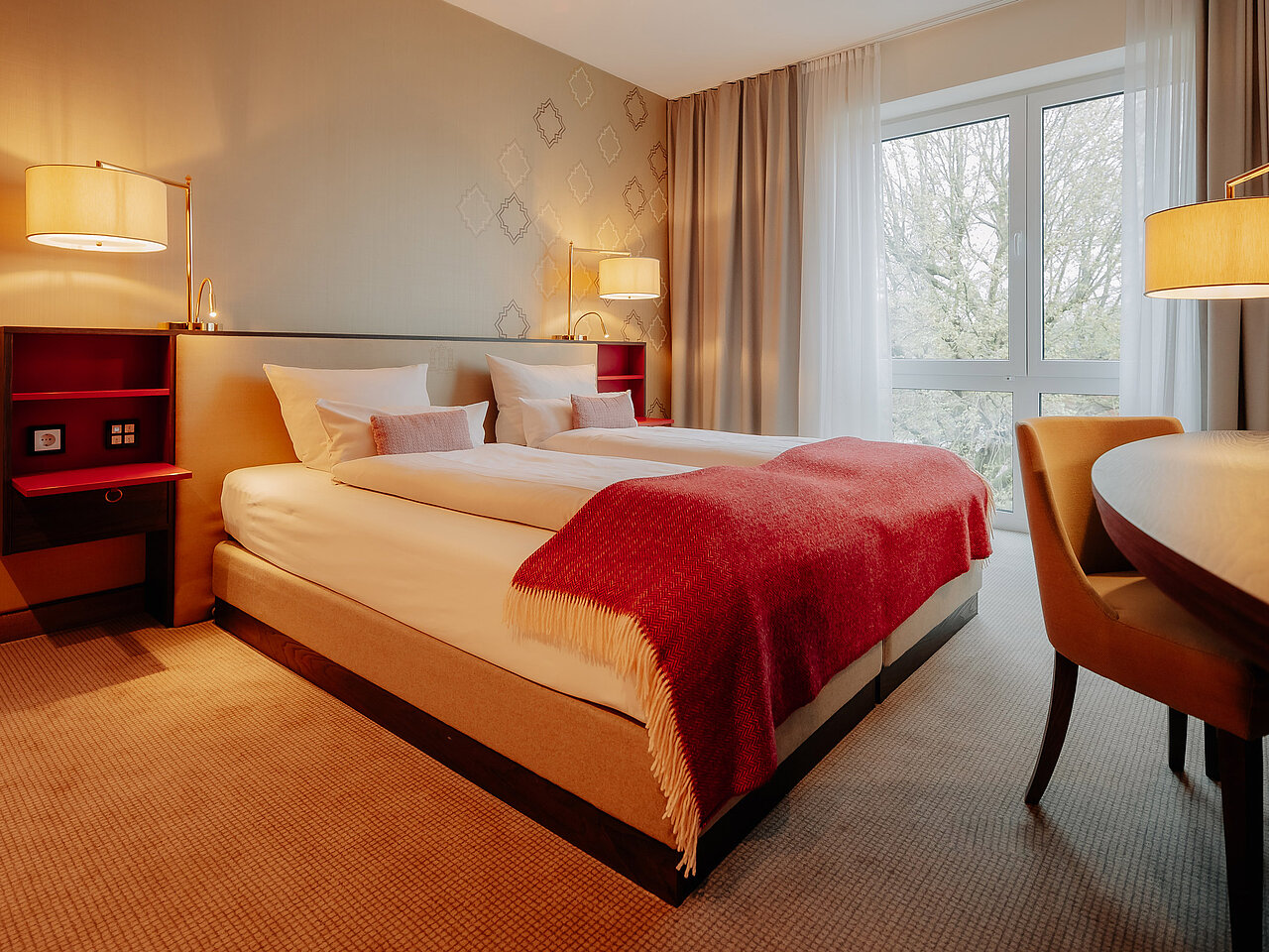 Komfort Doppelzimmer im LOOKEN INN mit großem Bett und stilvoller Einrichtung