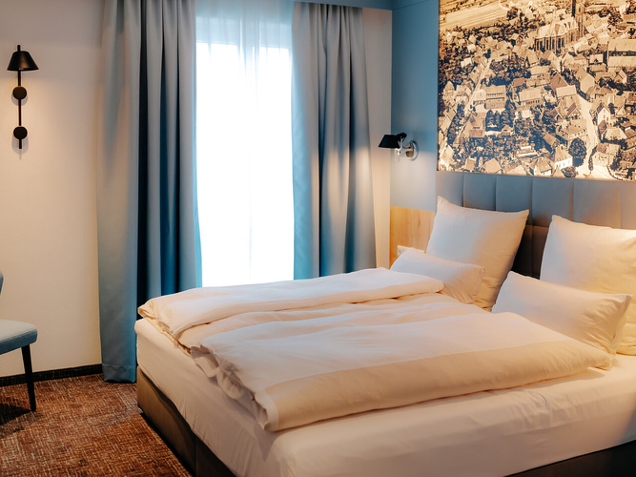 Komfortables Doppelzimmer im Hotel Stadthöfe Rhede mit heller Einrichtung