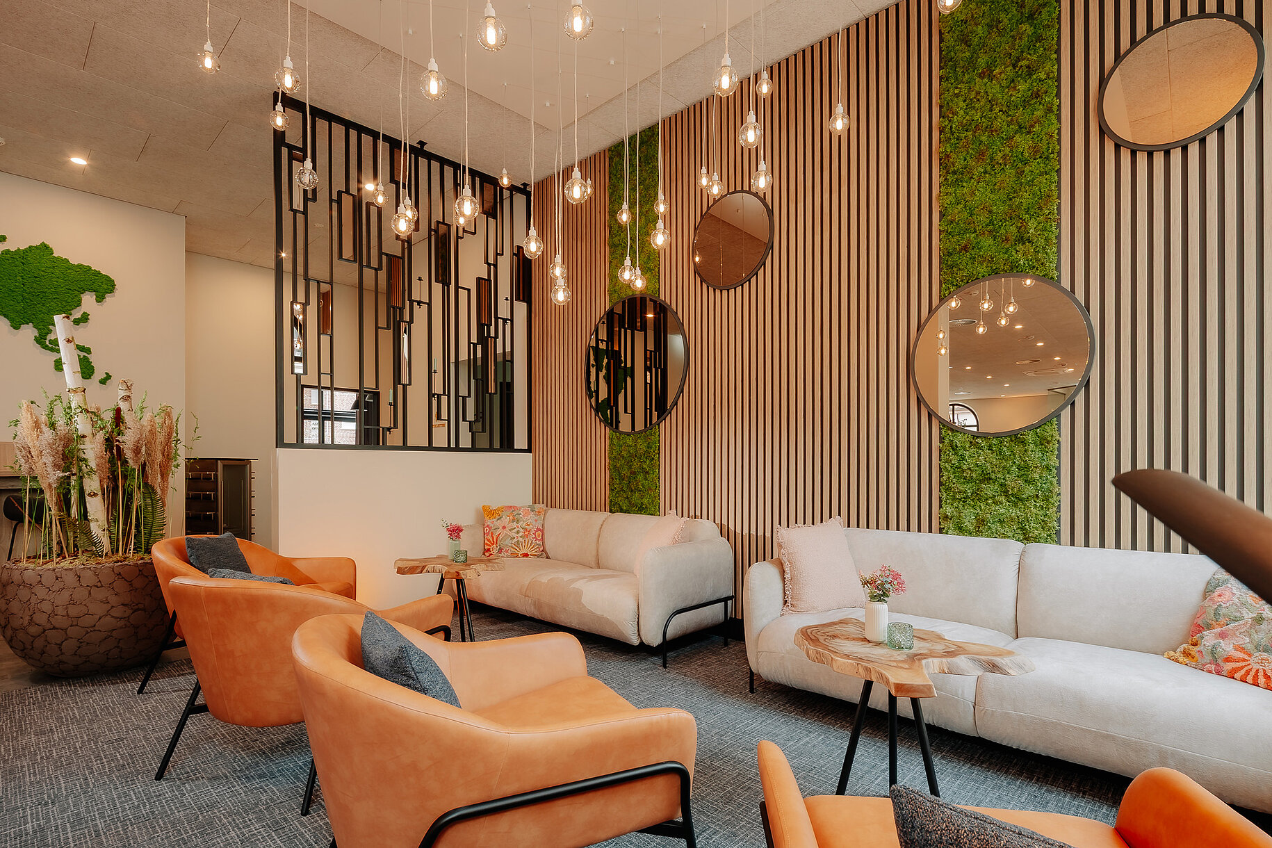 Gemütliche Lobby im Hotel Stadthöfe Rhede mit modernem Design